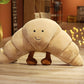 Smiley Croissant Plush Cushion